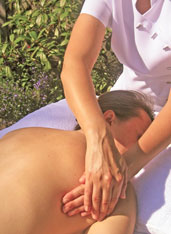 massaging below shoulder blade
